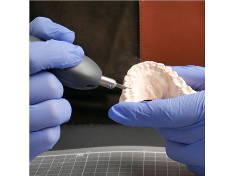 CtrlAX  Ultrasonic Cutter is using on dental supplies